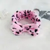 Diadema deportiva de coral fleece estilo coreano para el baño, banda para el pelo femenina, diadema de felpa con lazo para lavarse la cara y el maquillaje, tocado, venta al por mayor