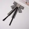 Envío gratis XXIV modelo nuevo lazo de encaje negro estilo princesa broche de lazo corsage nueva ropa para mujer