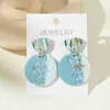 Brincos Redondos Coloridos Artesanais de Argila Macia Estilo Resort para Mulheres com Design Único e Pingentes de Orelha Pintados Personalizados Tendência Atacado
