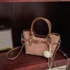 Bolso tote de hombro vintage de gran capacidad para mujer, bolso cubo de hombro de moda para el verano 2026, elegante bolso de axila