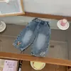 QY266698 Conjunto Infantil 2026 Otoño Nuevo Estilo Camisa Polo Rayada para Niños Jeans con Dibujos Conjunto de Dos Piezas