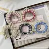 Sanrio Flor de Renda Intestino Grosso Cuidado com o Cabelo Faixa de Cabelo Fofa Desenho Animado Coração de Menina Pequeno Fresco Doce Anel de Intestino Alta Elasticidade