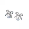 Pendientes de perlas con lazo elegantes de primavera para mujer, pendientes atmosféricos de sentido avanzado, pendientes únicos de lujo y nicho.