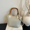 2026 Nuevo Bolso de Mano para Mujer con Diseño Elegante Moda Bolso Cubo de Moda Bolso Cruzado de Cesta de Alta Gama para Mujer