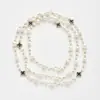 Colección Larga de Collares Superpuestos de Perlas Swarovski para Mujer, Estilo Lujo Ligero, Cadena Versátil para Suéter con un Toque de Alta Gama, Venta al por Mayor Otoño e Invierno