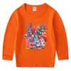 2026 Nova Camiseta Infantil de Primavera e Outono Gola Redonda Desenho Animado Manga Longa Camiseta Básica Conjunto para Meninos e Meninas Camiseta de Algodão