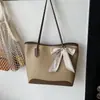 Lenço de seda de grande capacidade europeu e americano 2026 novo estilo de verão bolsa de mão casual simples elegante bolsa tote ombro para mulheres