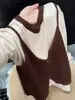 Suéter Versátil de Color Sólido Adelgazante de Corte Holgado Nuevo Estilo Primavera y Otoño 2026 Top de Punto Patchwork de Cuello Redondo Falso de Dos Piezas para Mujer