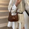 Bolso Media Luna de Piel Patentada de Moda para Mujer 2025 Nueva Llegada Elegante Nicho Versátil Bolso Cruzado Bolso Vintage para Viajero