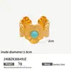 Anillo Tyna French de Oro de 18K Turquesa Acero Inoxidable para Mujer Apertura Cruzada de Alto Nivel Flor de Acero de Titanio