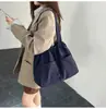 2026 Nuevo Modelo Color Sólido Gran Capacidad Diseño de Nicho de Moda Versátil Bolso de Hombro Bolso de Mano Bolsa Tote para Estudiantes
