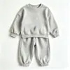 Conjunto de moletom infantil liso para meninos e meninas, conjunto de duas peças com calça de moletom soltinha com punhos, roupas infantis de outono, fornecimento transfronteiriço