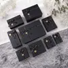 Venta al por mayor de cajas de regalo listas para enviar con tapas y bases, diseño de moño LOVE, cajas de regalo de alta gama, cajas vacías, cajas de regalo negras y cajas de regalo personalizadas