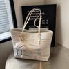 Bolso de mano informal de gran capacidad para mujer, bolso de hombro de estilo estilista, nuevo diseño de nicho 2024, bolso de clase para estudiantes universitarios.
