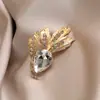 2025 Nuevo Broche de Espiga de Trigo Antideslizante de Luz Lujo Ligero Corsage de Mujer de Gama Alta Pin para Abrigo Suéter Venta al por Mayor