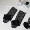 Calcetines de verano para mujer nuevos ultradelgados negros y blancos amor elásticos de malla calcetines de tubo transpirables viento Lolita calcetines de pila