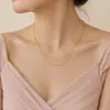 Collar multicapa de metal francés de alta calidad, diseño de nicho de lujo ligero, cadena de clavícula de estilo frío extremadamente simple