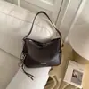 Bolsa Retro de Ombro Único para Axila Feminina Outono e Inverno 2026 Nova Tendência Moda Coreana Bolsa Saco Simples de Grande Capacidade Feminina