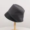 Chapéu de pescador novo simples com retalhos listrados de outono e inverno coreano para mulheres, moderno e versátil, chapéu bucket de viagem estilo irregular