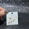 Nuevo Conjunto de Aretes de Múltiples Piezas, Aretes de Mariposa, Circonita Súper Brillante, Galvanizado Ecológico, Aguja de Plata S925, Moda de Invierno