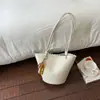Bolso de cubo de nicho transfronterizo para mujer, nuevo bolso de mano versátil de moda 2026 con patrón de lichi, bolso de hombro cruzado