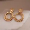 Brincos Pendentes Quadrados Redondos de Metal Agulha de Prata Brilho Leve de Luxo Brincos de Tarraxa de Ponta High-End Brincos Transfronteiriços Europeus e Americanos com Senso de Design Niche