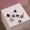 Pendientes de Plástico No Alérgicos Estudiante Mujeres Simples Negros Pequeños Temperamento Flor de Cuatro Hojas Hierba Agujeros de Oreja Pendientes Venta al por Mayor