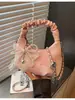 Bolso de Mano de Nicho Estilo Coreano Transfronterizo Bolso Dumpling para Mujer Otoño 2026 Nuevo Plegado Casual Versátil Bolso de Hombro Cruzado
