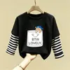 Camiseta de manga larga de algodón puro para niño 2026 primavera y otoño nueva elegante de dibujos animados estilo dos piezas falsas camiseta base de primavera para niño