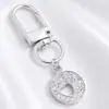 Lujo Ligero Chapado en Oro Full Diamante Charm Hebilla en Forma de D Colgante Hueco en Forma de Corazón Accesorios para Bolsos Llaves Fábrica Stock Mayorista