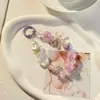 Cadena Minimalista para Teléfono con Perlas y Lazo, Correa de Muñeca, Cadena de Mano, Portacámaras y Llavero para Mujer