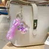 Nuevo Llavero Anillo de Botella con Muñeca de Arena Líquida, Colgante Exquisito de Dibujos Animados para Mochila para Niñas y Niños, Accesorio de Pareja, Pequeño Regalo para Eventos