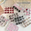 Decoraciones Mini Lazo para Uñas 12 Compartimentos Tamaños Mixtos Popular Transfronterizo Blanco y Negro Rosa Lazo Uñas Accesorios de Pedrería Venta al por Mayor