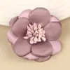 Fábrica de origen en stock al por mayor núcleo de flor de dos colores lado quemado flor flor hecha a mano tela de flor accesorios de ropa de flor joyería diy