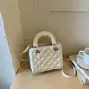 Bolso pequeño de alta gama de moda para mujer, nuevo bolso de hombro 2026 para el trabajo y los desplazamientos, bolso cruzado