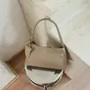Bolso para mujer diseño de nicho sentido del diseño bolso francés de axila otoño e invierno bolso de mano de un solo hombro de alta gama versátil lujo ligero de moda estilo mujer