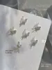 Nuevos Rhinestones para Uñas Qiansi Mengdie Zirconio Acabados 3D Doble Capa Ala Fina Ala de Mariposa Decoración de Rhinestone para Uñas Venta al por Mayor