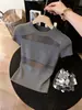 Popular Design de Seda de Gelo Moda Malha Vazada Top para Mulheres 2026 Verão Novo Solto Versátil Manga Curta Camisa