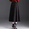 Falda de lana a cuadros de longitud media para mujer para el invierno 2026, nuevo diseño de cintura alta, que cubre las caderas, adelgazante, retro y con una caída fluida