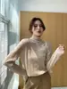 Suéter base de punto versátil de color liso con cuello alto, nuevo estilo otoño e invierno 2026, suéter de punto de algodón coreano ajustado con diseño calado para mujer