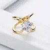 Hebilla de toalla de seda de tres anillos con personalidad creativa, venta transfronteriza, moda, combina con todo, hebilla de chal con diamantes de imitación dulces y huecos cruzados