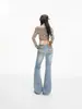 Jeans de campana de tiro bajo azul retro americano para mujer, nueva colección primavera/otoño 2026, con diseño de estampado de leopardo, pantalones largos de campana elegantes y modernos