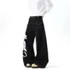 Jeans retro americanos de corte curvo deconstruido, estilo otoño e invierno, diseño de alta costura, corte holgado, adelgazante, pantalones de pierna ancha con caída.