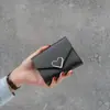 Nueva versión de la billetera para mujer, corta, de moda, triple pliegue, para estudiante, fresca, simple, mini billetera, venta al por mayor transfronteriza