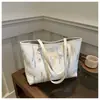 Bolsa Tote Costurada Transfronteiriça para Mulheres 2026 Novo Estilo Textura Simples Grande Capacidade para o Dia a Dia Bolsa de Ombro