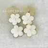Botón de metal de alta gama, botón con forma de flor de resina, hebilla decorativa, flor acrílica con destellos finos, base dorada, hebilla linda para niña
