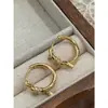 2026 Nuevos Exquisitos y Modernos Pendientes de Nudo de Metal Estilo Coreano para Mujer con un Toque de Lujo y Elegancia