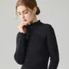 Capa base de punto de color liso, con cuello semi alto y ribete de encaje para mujer, nuevo suéter ajustado otoño/invierno, top de forro polar Andy