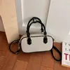 Nova Bolsa de Bowling Outono/Inverno 2026 Moda Feminina Bolsa de Mão Bolsa Transversal Retro Versátil Bolsa de Ombro para o Dia a Dia