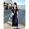 Conjunto de Verano de Dibujos Animados 2026 Dulce Lindo Gato KT Camiseta de Manga Corta Informal Pantalones de Pierna Ancha con Parches a Cuadros Conjunto de Dos Piezas